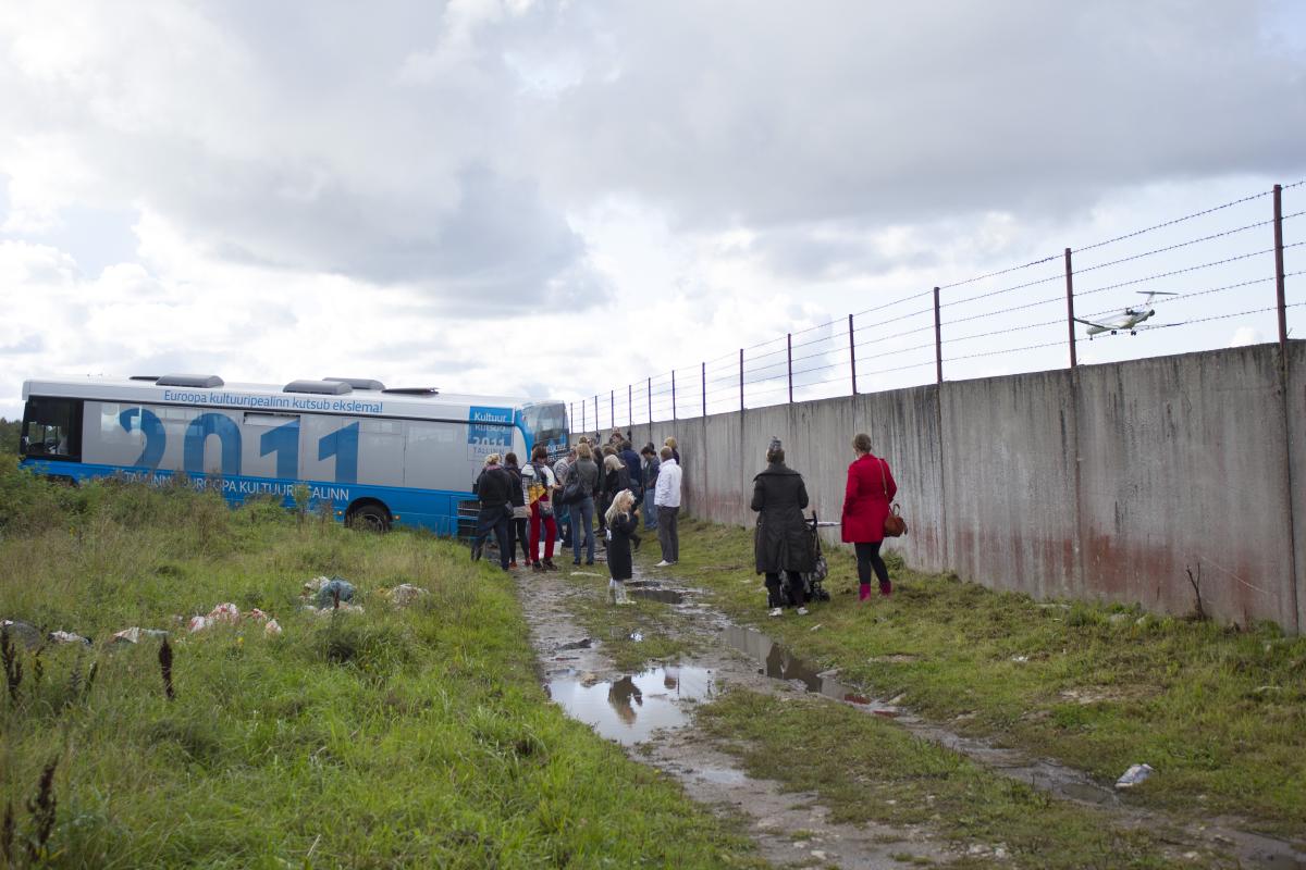 Bus tour from the city got stuck in the muddy roads.